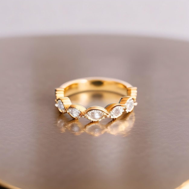 A gold ring with diamonds on a gold surface