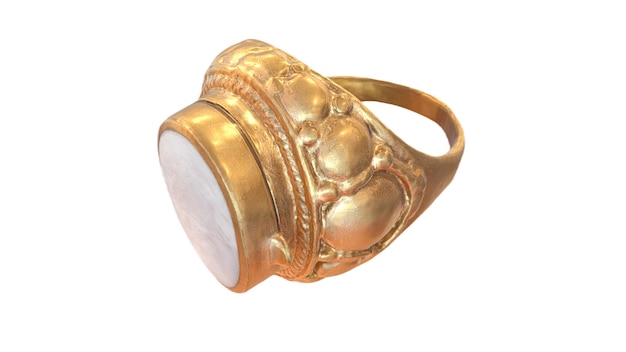 A gold ring with a stone on the top