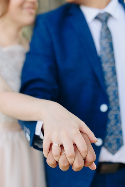 Gold rings of the bride and groom close-up