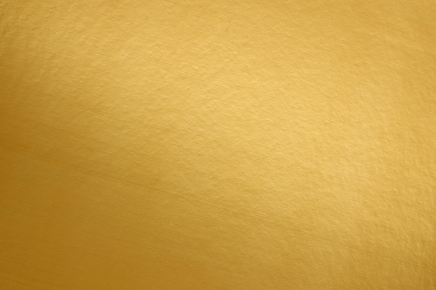 A gold sheet of paper with a rough edge