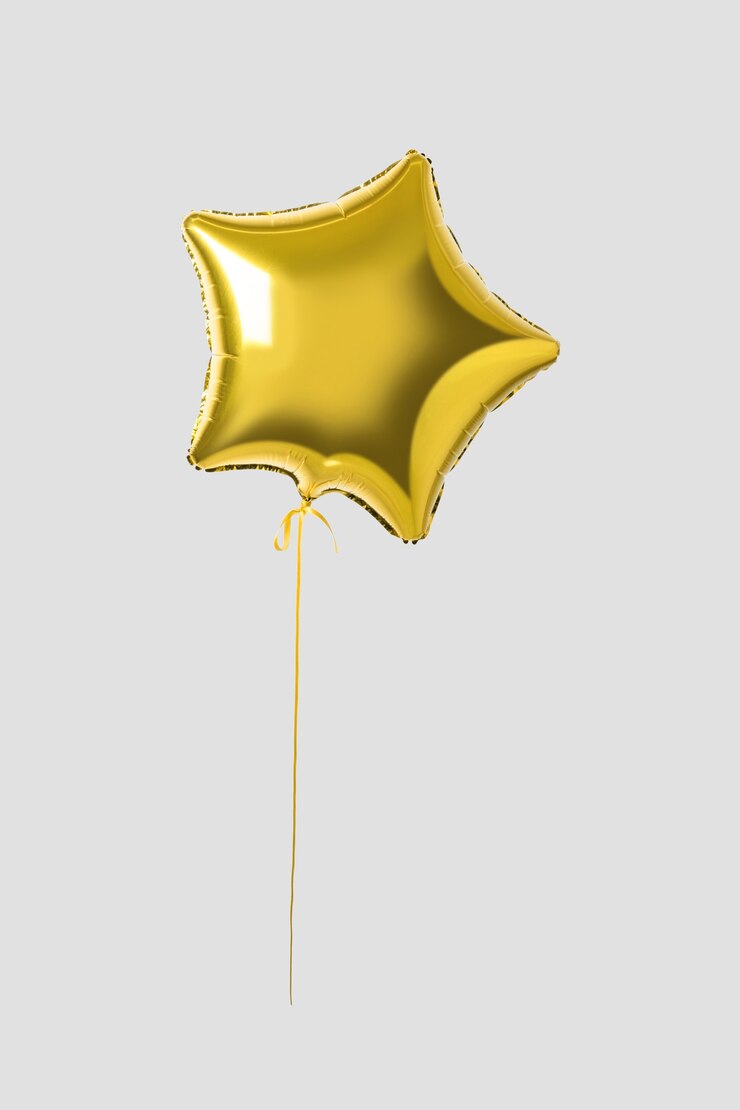 Gold star balloon isolated on grey