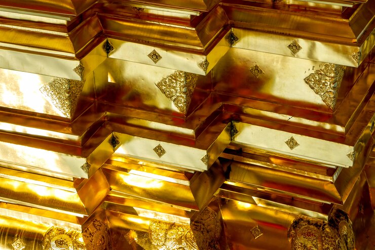 Photo 壁のネイティブタイスタイルの金色のスタッコ