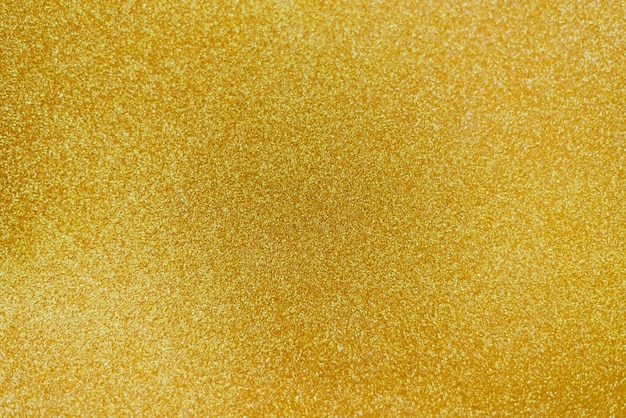 Sfondo texture oro con glitter giallo glitter per sfondo vacanza sfondo decorazione natalizia