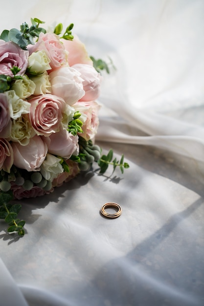 Gold wedding rings for newlyweds on wedding day