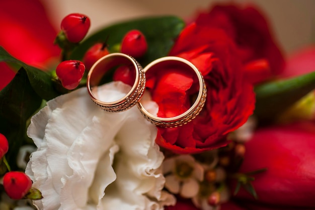 Gold wedding rings on the pincushion