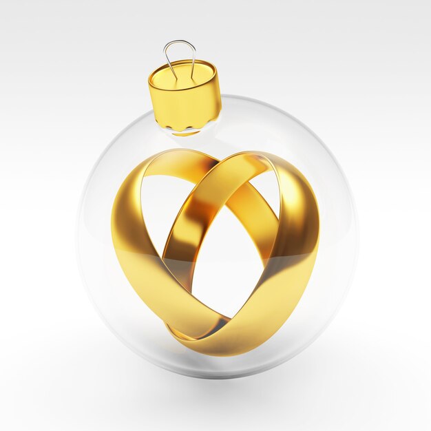 Gold wedding rings in a transparent christmas ball