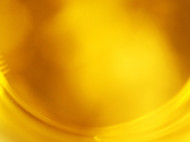ゴールドイエローカーブの抽象的な背景