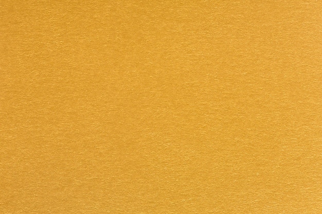 Золотая желтая роскошная бумажная текстура. качественная текстура в чрезвычайно высоком разрешении