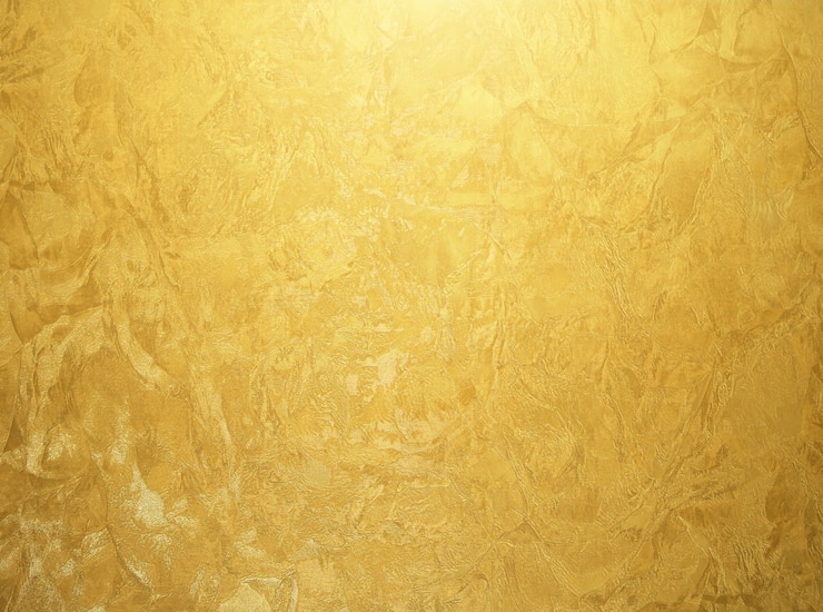 Photo 金色の背景テクスチャ。