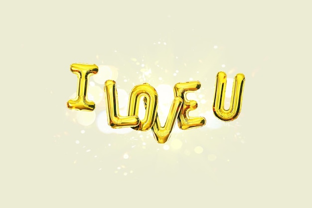 Golden balloons I Love You on a beige background with bokeh lights and sparks Love card a creative idea