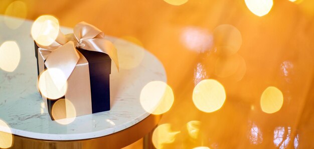 Golden balls glow the concept of the new year and holidays
designer gift boxes the garland