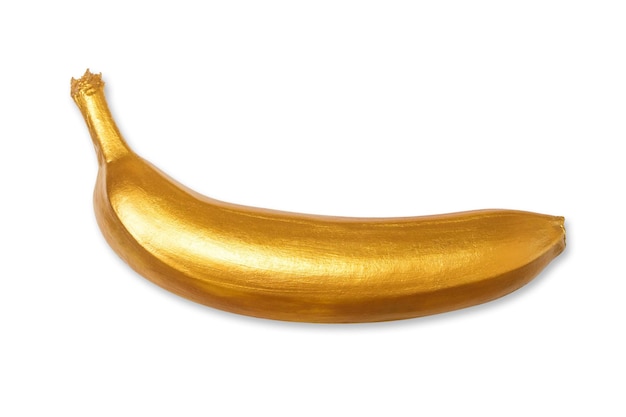 Золотой банан на белом фоне Креативная концепция с фруктами
