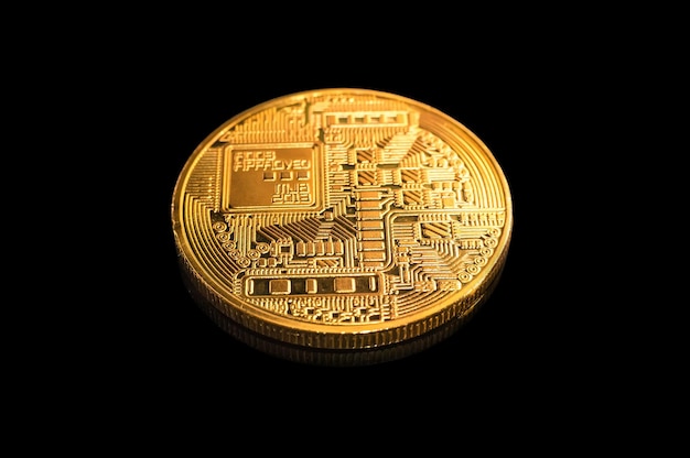 Golden Bitcoin on a black background