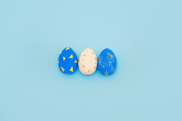 Golden and blue Easter eggs