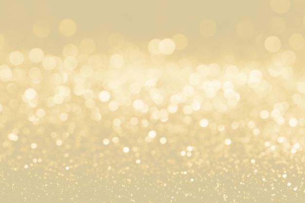 Golden bokeh like shining star on gold background