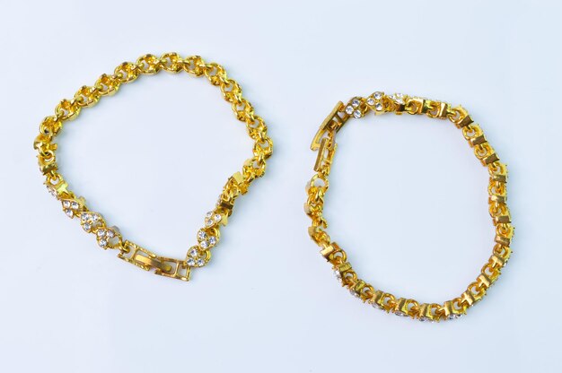 Golden bracelets isolated on a white background