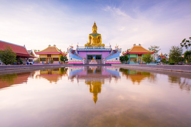 Golden buddha and beautiful sky