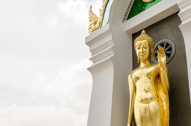 Golden buddha statue in thai temple
