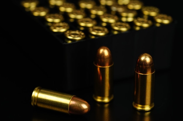 golden bullets on a black background