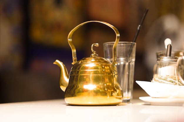 Golden cafe teapot background hd