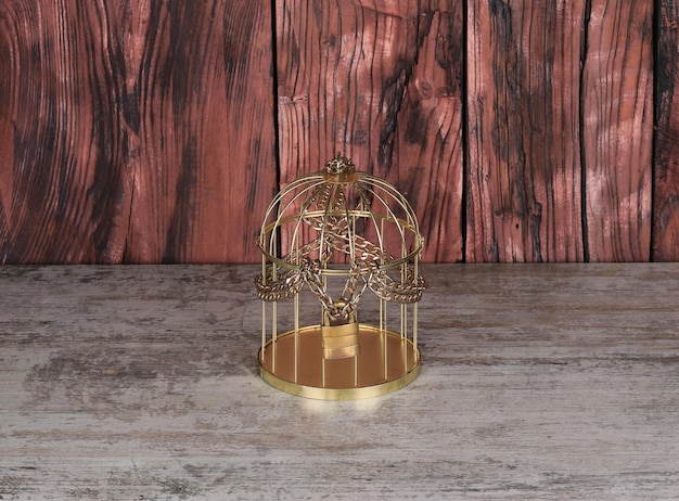 golden cage on the table