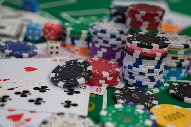 Golden Casino theme. casino roulette, poker chips on a gaming table