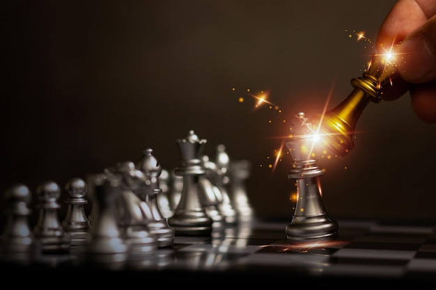 Golden chess to your opponent's business strategy Work Chess concept represents success team work