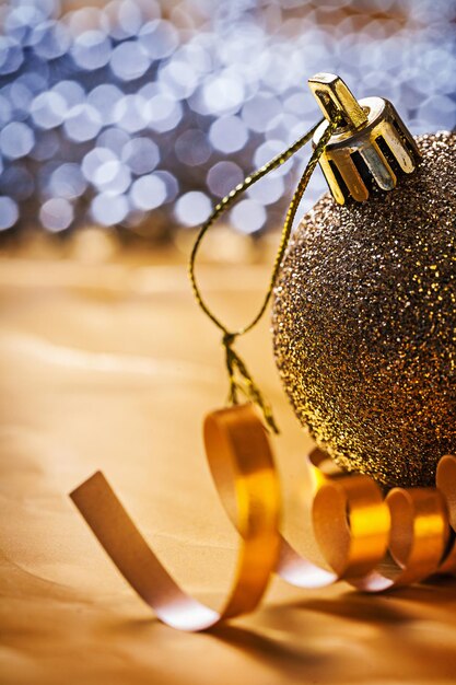 Golden christmas bauble close up.