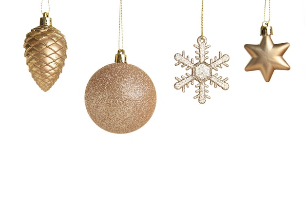 Golden Christmas toys isolated on white background. Top view