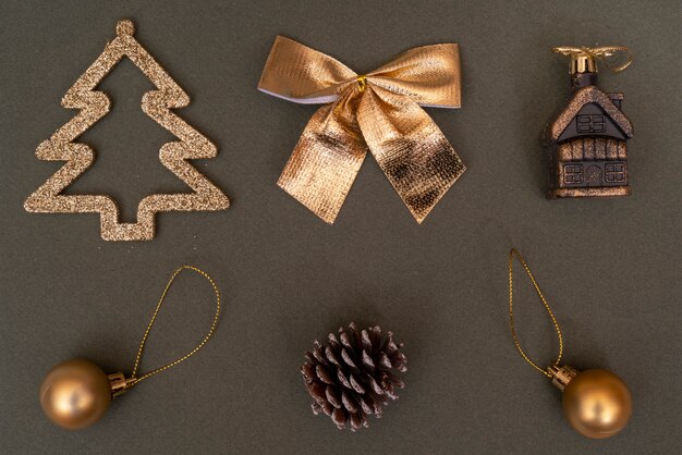 Golden Christmas tree decorations. Ball, bump, fir, bow.