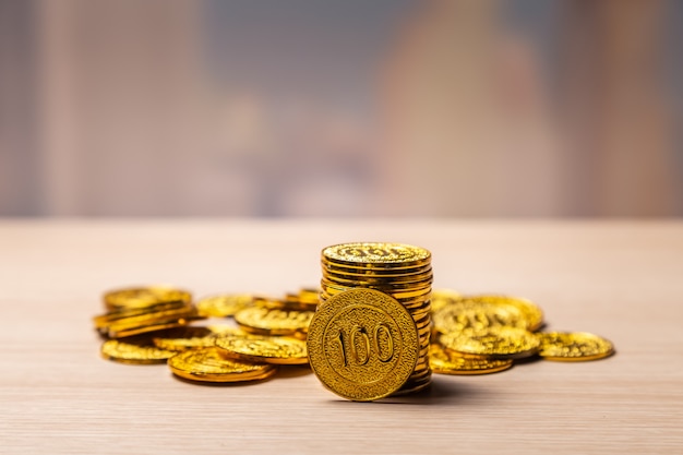 Golden coins stack background with copy space