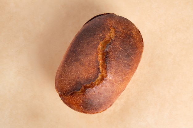 Golden crusty bread baked in the oven top view.