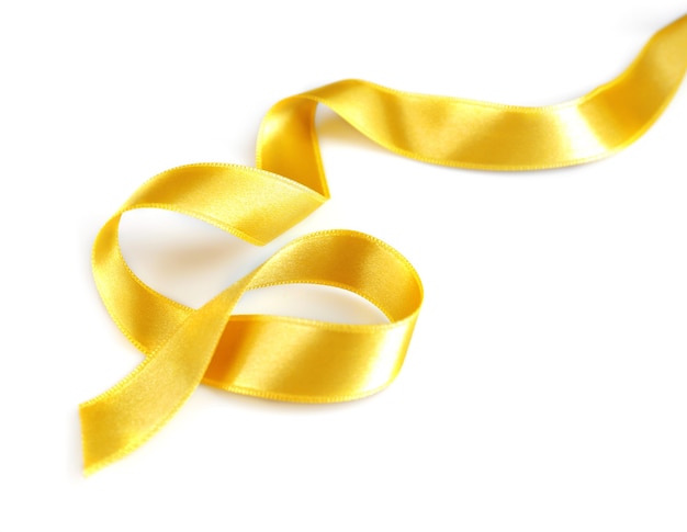 Photo golden curly ribbon isolated on white