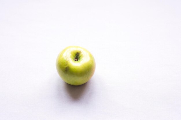 golden delicious apples on white background