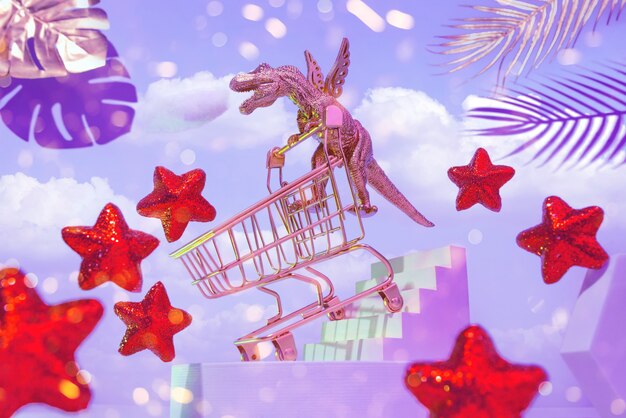 A golden dinosaur on wings with a trolley descends the stairs for shopping, around the sky, red stars, palm leaves, the concept of a big sale