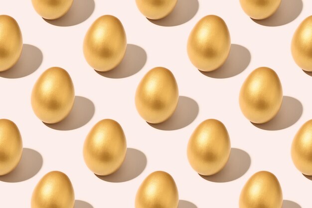 Golden Easter eggs on pink background luxury seamless pattern