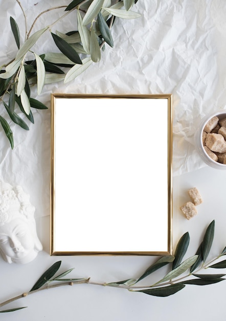 Golden frame mockup on white tabletop