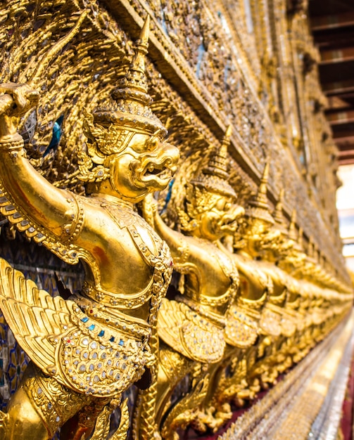 Golden garuda decorated on the wall.