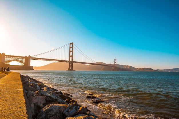 Golden gate and its beautiful sunset tones one summer afternoon\
united states
