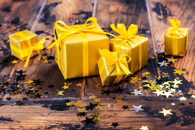 Golden gift boxes and confetti