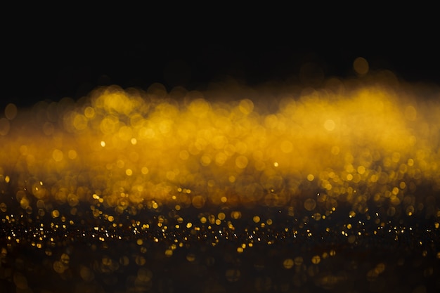 Golden glitter bokeh elegant abstract background