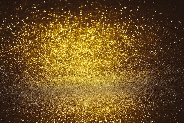 Фото Текстура освещения боке с золотым блеском размытый абстрактный фон на день рождения, годовщину свадьбы, канун нового года или рождества