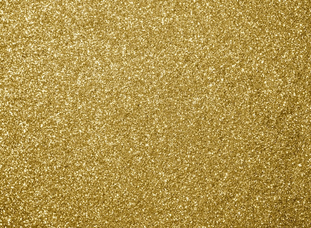 Golden glitter texture christmas abstract background.