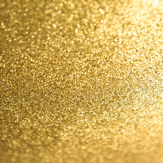 Golden glittering texture abstract background