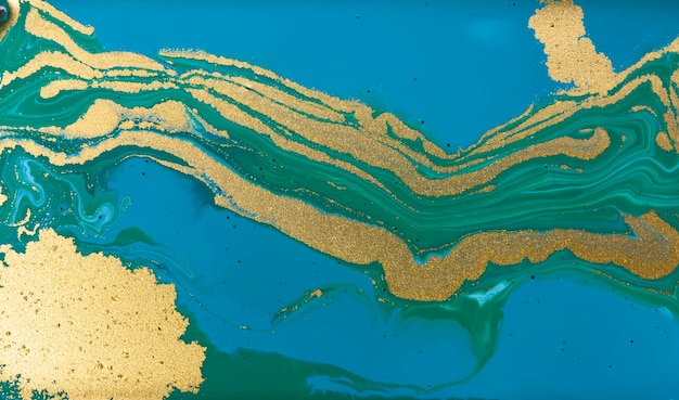 Golden and green wave veins on blue marble background