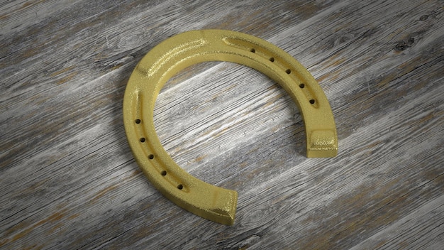 Golden horseshoe set on wooden surface