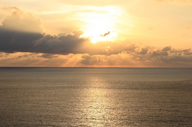 Golden light of sunset on the beach