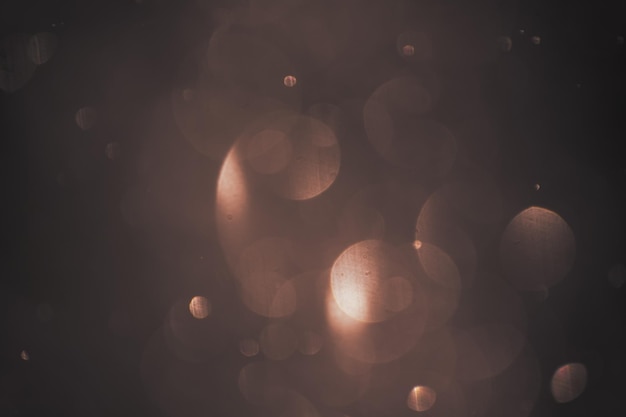 Golden lights bokeh background Abstract blurred glowing lights