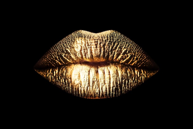 Golden lips isolated on black background luxury glamour art mouth clipping path gild lips