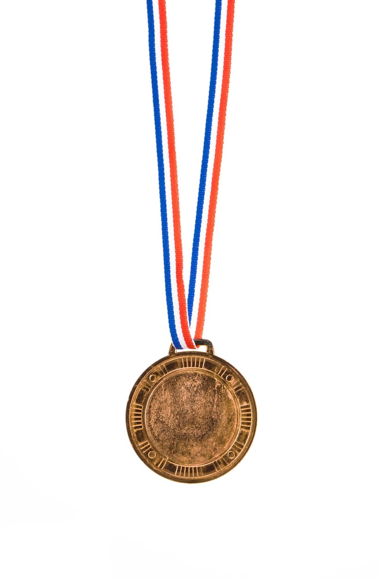 Photo golden medal is medal awarded isolated on white background.